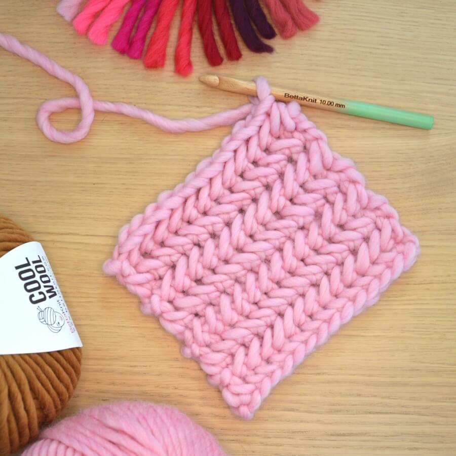 The Herringbone Stitch is a crochet stitch that reminds of the herringbone fabrics as seen on coats and jackets. This is a great stitch to make high-resistance bags and accessories, especially if using a medium/thick yarn. To crochet this stitch you will need to know the Single Crochet Stitch and Herringbone Single Crochet Stitch. You only alternate 2 rows across your project.